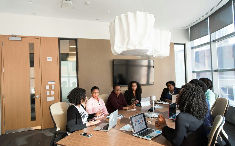 employees having a meeting around a table