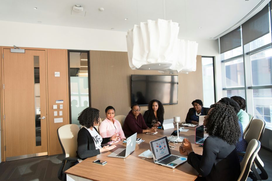 employees having a meeting around a table
